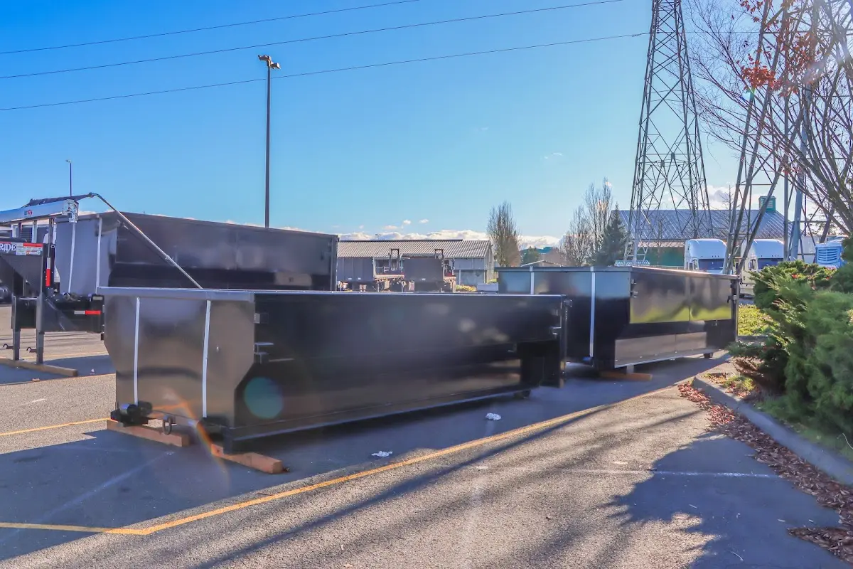 Roll-off dumpster ready for waste disposal at job site for Demolition Dumpster Rental in Chenango